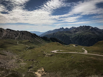 Scenic view of landscape and mountains against sky