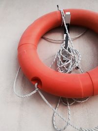 Close-up of chain hanging against wall