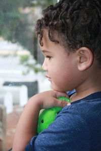 Portrait of cute boy looking away