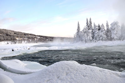 Scenic view of snow covered landscape