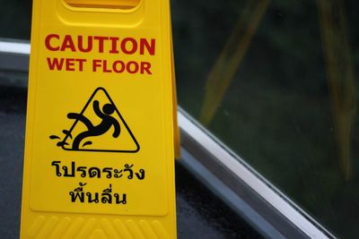 Close-up of yellow sign