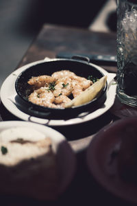 Close-up of food served on table