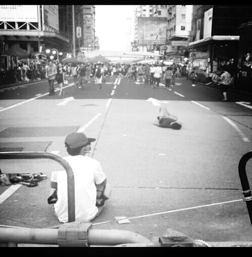 transportation, mode of transport, street, city, car, land vehicle, city life, large group of people, city street, person, men, road, road marking, zebra crossing, lifestyles, on the move, walking, building exterior, travel