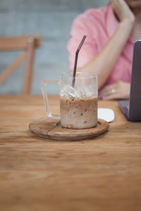 Close-up of drink served on table