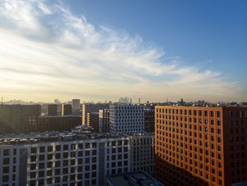 Buildings in city against sky