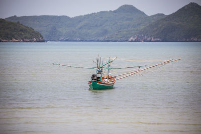 Fishing boat sailing in sea