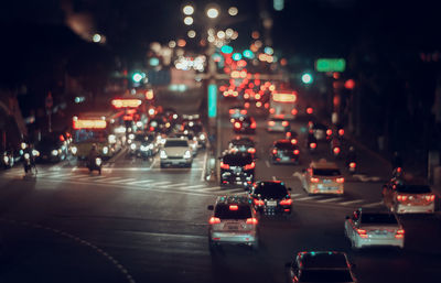 Traffic on city street at night