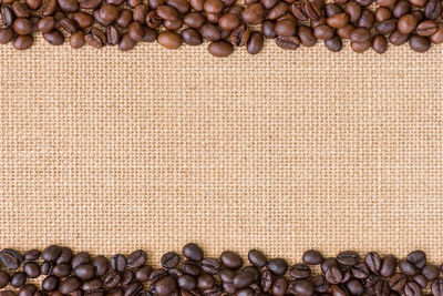 High angle view of coffee beans on burlap