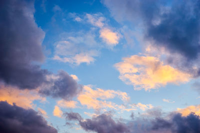 Low angle view of clouds in sky during sunset