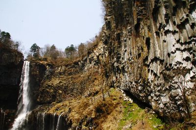 View of waterfall against clear sky