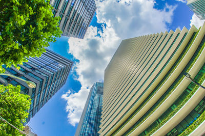 Low angle view of skyscraper against sky