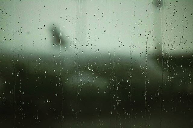 window, indoors, drop, wet, transparent, full frame, rain, backgrounds, water, glass - material, weather, raindrop, glass, focus on foreground, season, sky, no people, close-up, nature, silhouette