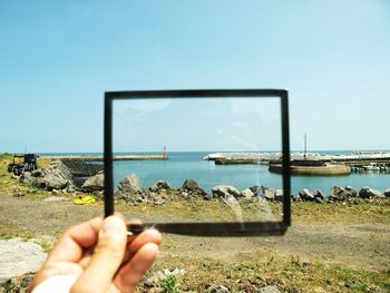 Scenic view of sea against clear sky