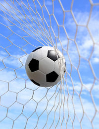 Close-up of soccer ball on grass