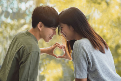 Young couple standing outdoors