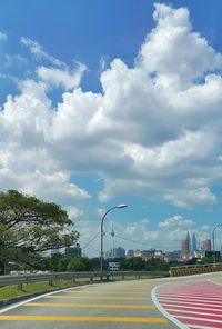 View of road against cloudy sky