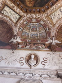 Low angle view of ornate ceiling of building