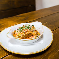 High angle view of lasagna in plate on table