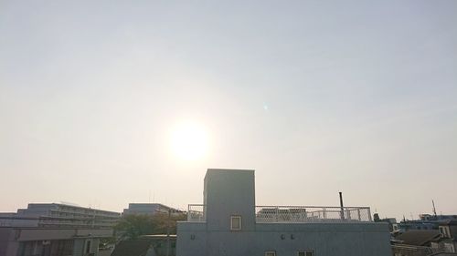 Buildings against sky during sunset