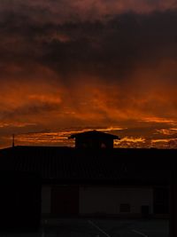 Scenic view of dramatic sky during sunset