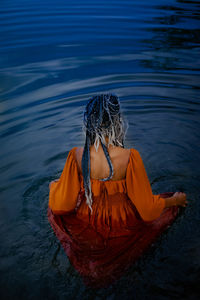 A photoshoot of girl in the water