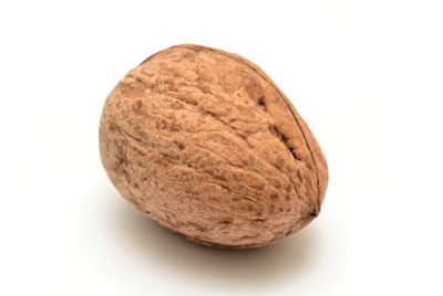 Close-up of bread against white background