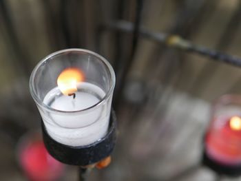 Close-up of illuminated tea light