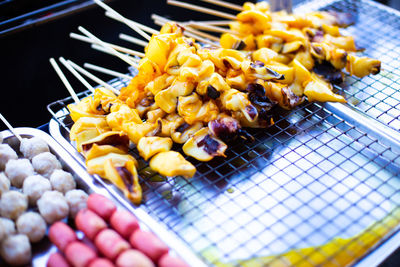 High angle view of meat on barbecue grill