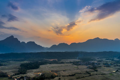 Scenic view of mountains against sky during sunset