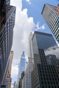 Low angle view of modern buildings against sky