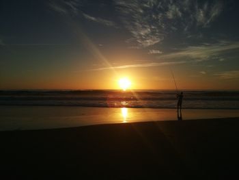 Scenic view of sea at sunset