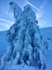 Snow covered mountain against sky