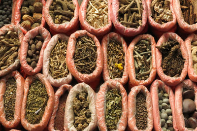 A spice vendor among the streets of mumbai selling a variety of flavours