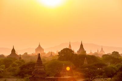 Temple against sky during sunset