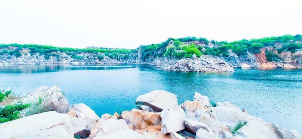 Scenic view of sea against clear sky