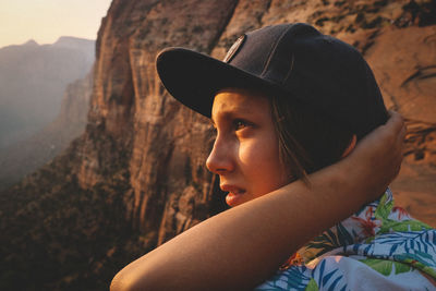 Portrait of young woman looking away