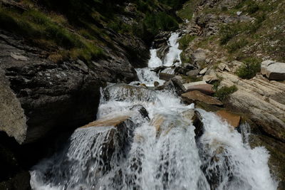 Stream flowing through rocks