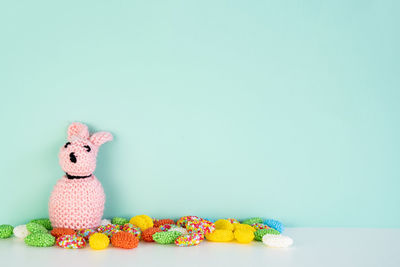 High angle view of stuffed toy over white background