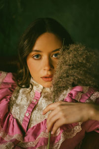 Portrait of young woman looking away