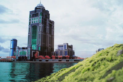 Modern buildings against sky in city