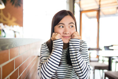 Portrait of a smiling young woman