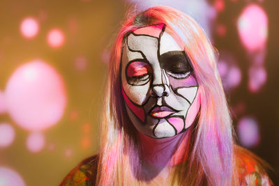 Close-up of woman with face paint