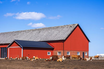 House on field against sky