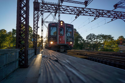 Train on railroad track against sky