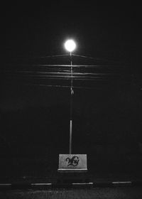 Illuminated street light at night