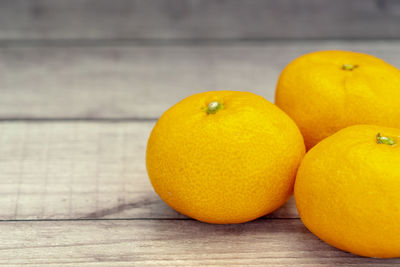 Close-up of orange fruits on table