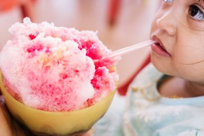 Close-up of girl eating ice cream