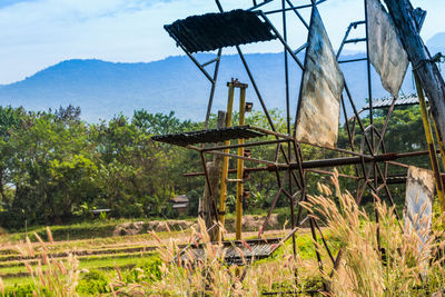 Traditional windmill against sky