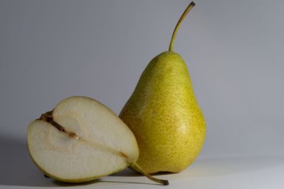 Close-up of fruit against white background