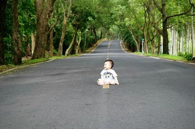 Road passing through trees